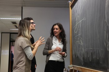 People discussing in a lab